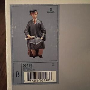 Lladro Boy Graduate Figurine - never taken out of box, discontinued